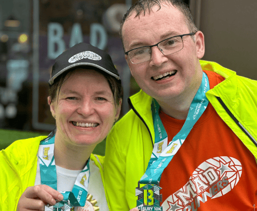 Bury 10k runners with their medals