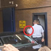 Dale Houghton was whisked away in a waiting black Peugeot as he attempted to avoid reporters outside Sheffield Magistrates' Court today. (Photo courtesy of Harry Harrison)