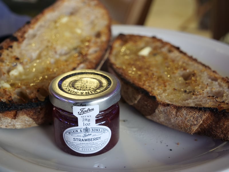 Clart means to spread with too much butter, jam or other topping. Is there such a thing as too much butter?