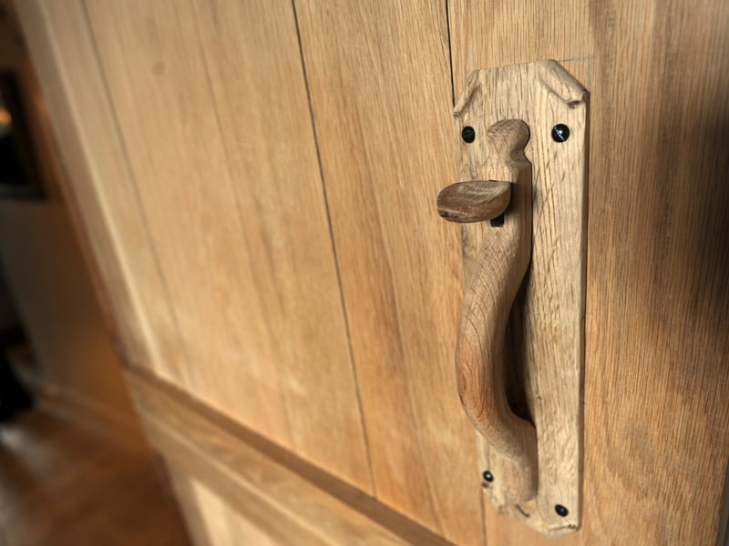 Sneck refers to a dor latch, with a 'sneck lifter' sometimes used to mean a gift someone takes home to his wife, as a bribe to get him in if the door has been bolted