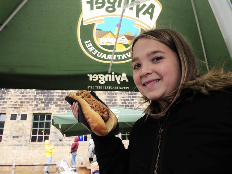 Lottie Tyler, 12 of Farsley about to tuck into a bratwurst at the family session.