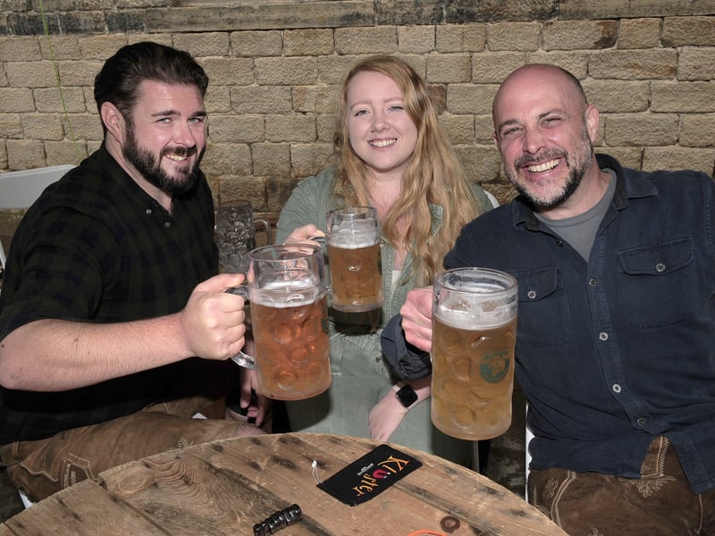 Andy and Daisy Gilpin and Matt Eyre at the Oktoberfest celebrations in Farsley.
