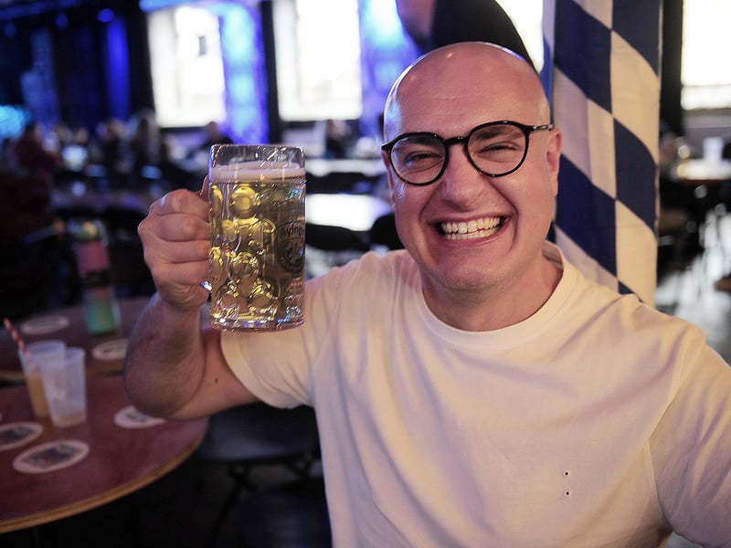 Jamie Hickabottom  cheers at the Old Woollen Oktoberfest celebrations.