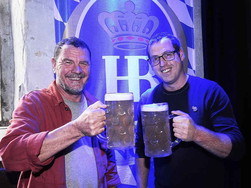 Andy Parish and Andy Robinson enjoy beer.