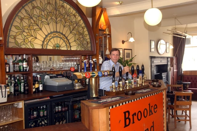 Steve Cowie at the bar of the pub in 2005.