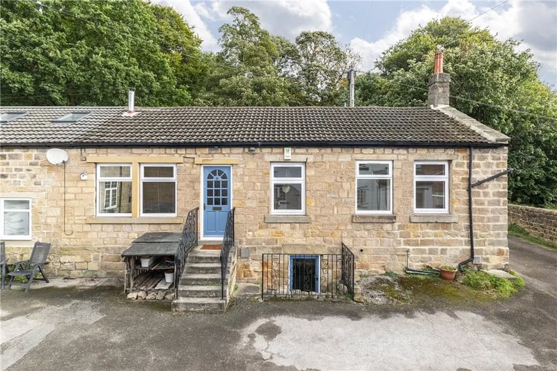 This deceptively spacious stone cottage in Meanwood is on the market.