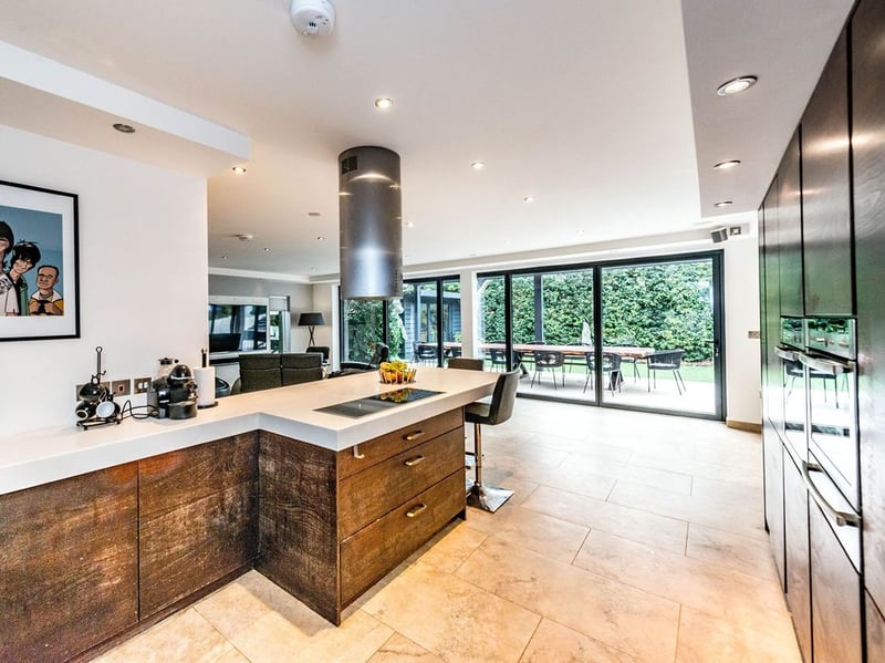 The open plan kitchen looks out into the garden. (Photo courtesy of Zoopla)