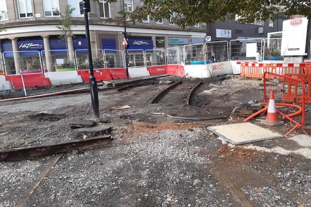 Exposed tram tracks at the top of Fargate in Sheffield city centre. Picture: David Kessen, National World