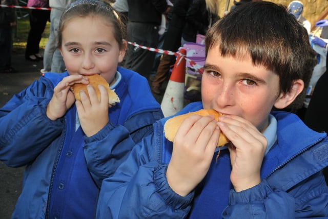 Brother and sister, Keaton and Maddison Lambton enjoying their ox roast sandwich in 2012.