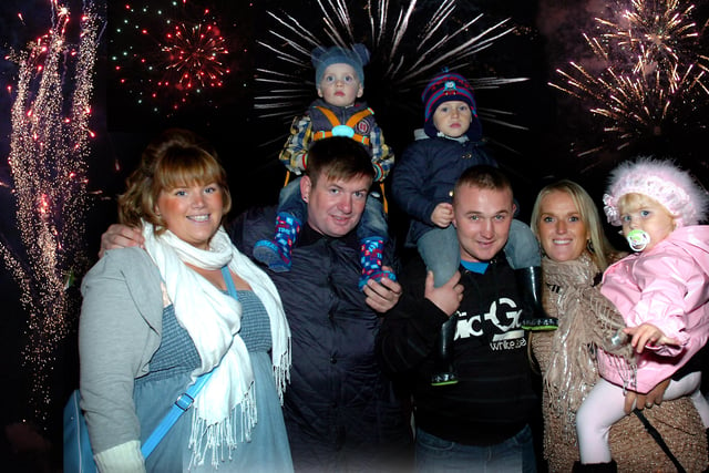 Here's Callie and Jeff Clark with Conrad Shol, Craig Wear with Fenton Shol and Ashley Young with Lacey Wright enjoying the firework display as part of the Houghton Feast celebrations 12 years ago.