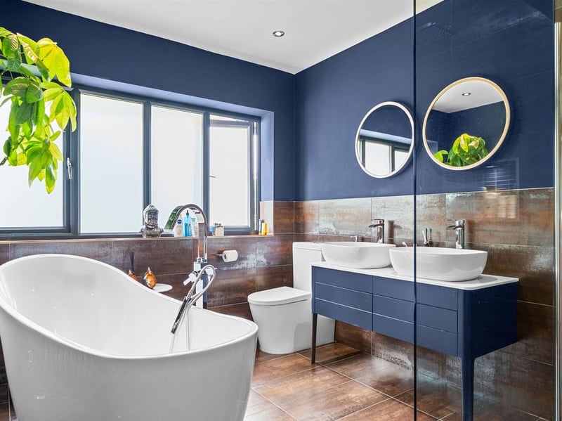 The four-piece family bathroom on the first floor features a "stylish" free standing bath. (Photo courtesy of Zoopla)
