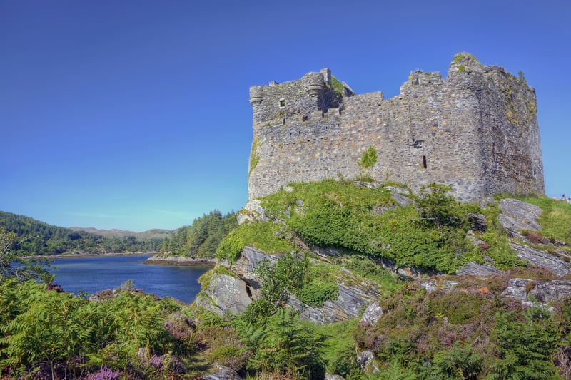 Castle Tioram is a ruin that sits on the tidal island of Eilean Tioram in Loch Moidart in the Scottish Highlands. It dates back to the 14th century but the earliest settlement of the site is linked to the Iron Age. The name in Gaelic “Caisteal Tioram” means “dry castle”.