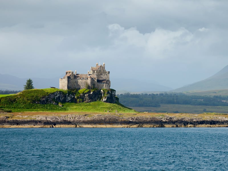 Duart Castle is perched on a rocky headland towards the Isle of Mull. Although it dates to the 13th century it was razed by English invaders in 1756. The name in Gaelic “Dubhaird Caisteal” is said to mean the “Black Promontory” as “dubh” signifies “black” and “aird” means “the high place”.