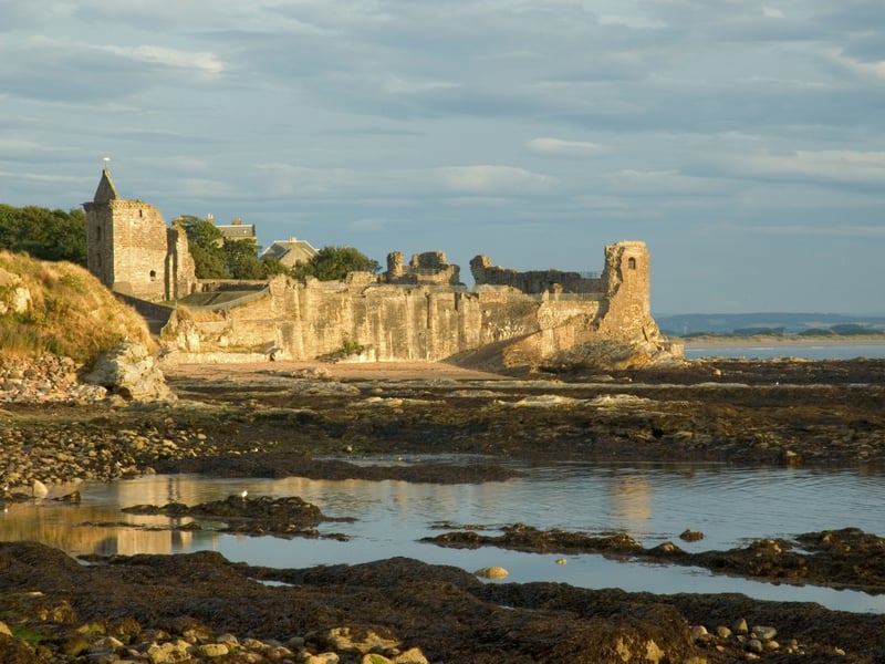 The ruins of the castle rests on the headland to the north of St Andrews. What remains of the structure of the Archbishops of St Andrews in part dates from the 13th century. It is said that the town is so named as the relics of St. Andrew (the patron saint of Scotland) were said to have been brought there by the bishop St. Rule.