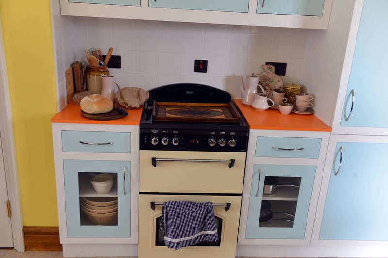 A fitted cooker and kitchen in one of the cottages.