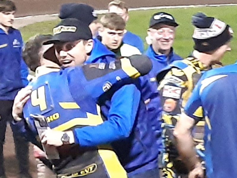 Team manager Simon Stead hugs  Josh Pickering after Sheffield Tigers win the Speedway Premiership. Picture: David Kessen, National World