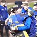 Team manager Simon Stead hugs  Josh Pickering after Sheffield Tigers win the Speedway Premiership. Picture: David Kessen, National World