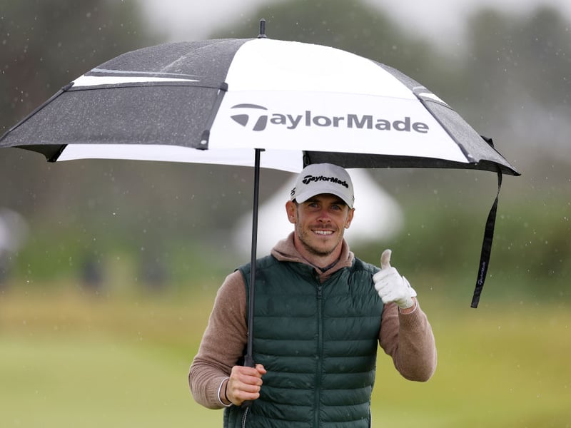 Footballer Gareth Bale didn't let the rain dampen his spirits.