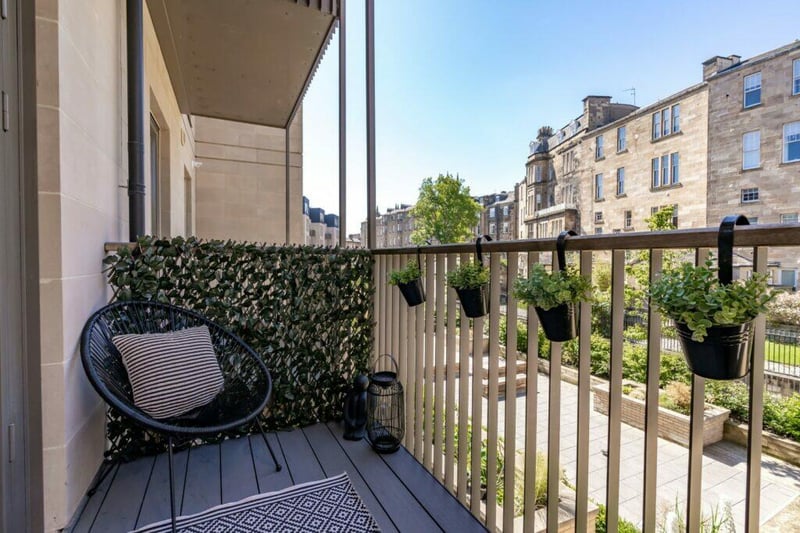 The large balcony area has stunning views of the residents garden grounds. 