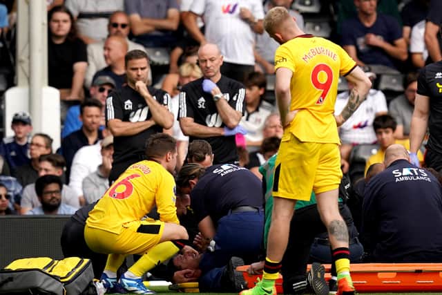 Chris Basham has been stretchered off at Fulham after a horror injury that appears to have badly damaged his ankle. Photo credit: John Walton/PA Wire