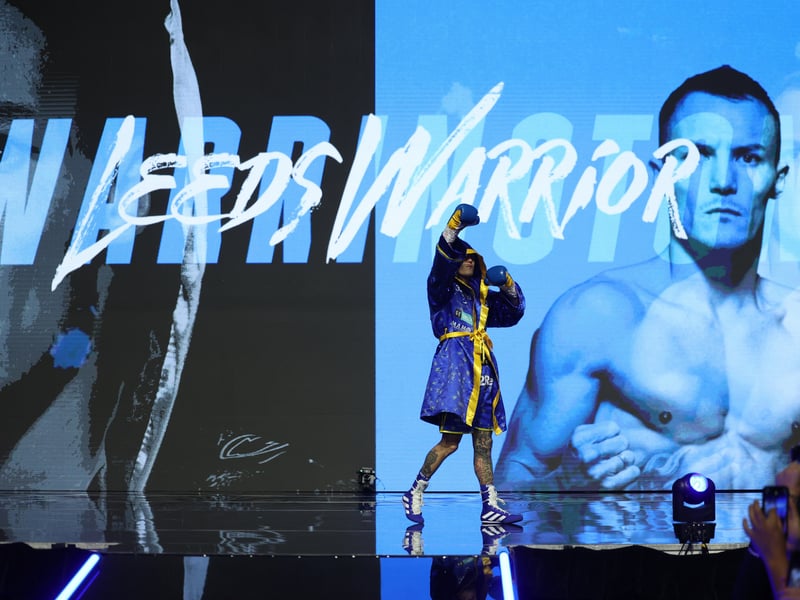 Warrington enters the arena