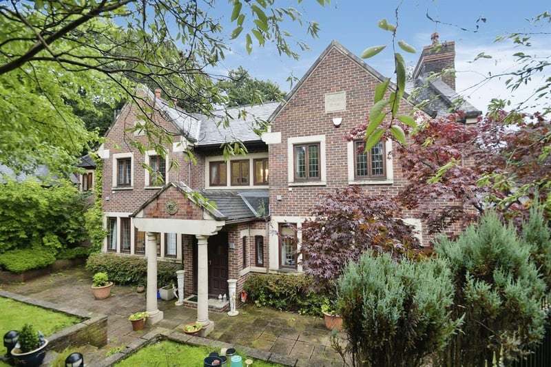 The £1.7m home in Riverdale Drive is at the end of a private cul-de-sac with a gated drive, featuring almost an acre of private garden and woodland.