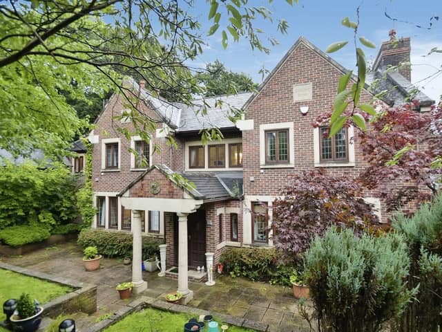 The £1.7m home in Riverdale Drive is at the end of a private cul-de-sac with a gated drive, featuring almost an acre of private garden and woodland.