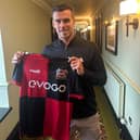 Former Real Madrid star Gareth Bale pictured with a Sheffield FC shirt, after signing it for the club. Picture: Matt Roney, Sheffield FC