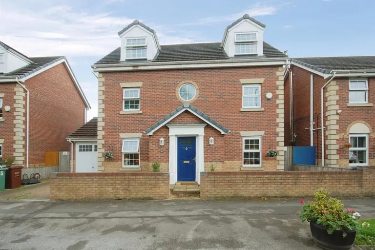 This five bedroom property is set over three storeys.