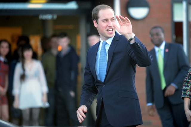 Waving to the crowds as he leaves, HRH The Duke of Cambridge, Prince William, after his visit to Centrepoint in 2013.