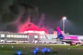 All flights suspended from Luton Airport after huge blaze rips through car park. (Photo: Ahmad Hassan Bobak/PA Wire) 
