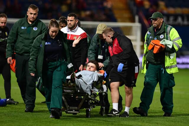 Sheffield United’s Doncaster Rovers loanee Louie Marsh is taken off on a stretcher after his injury. Andrew Roe/AHPIX LTD