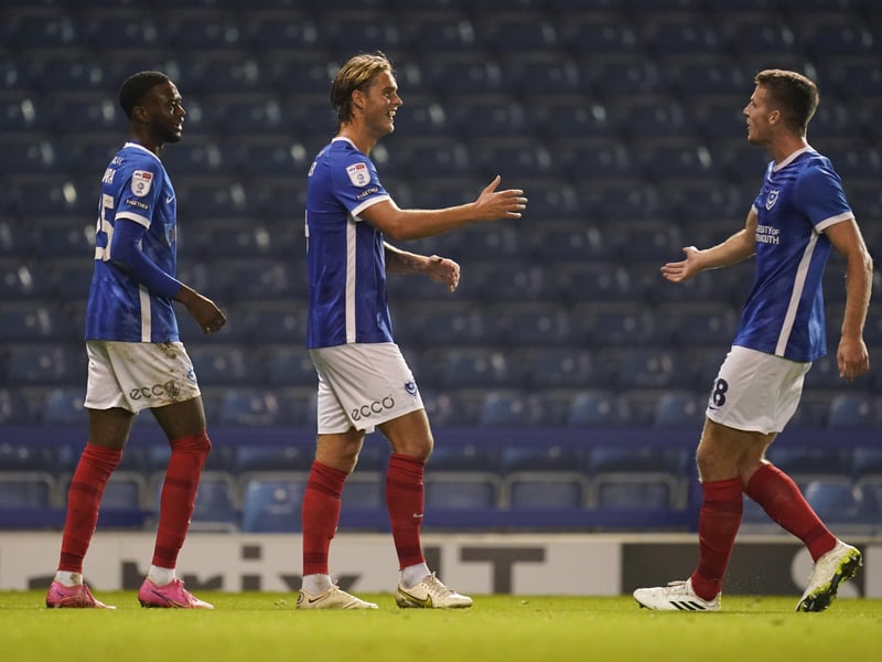 Ryley Towler celebrates with his teammates after scoring his 80th minute goal.