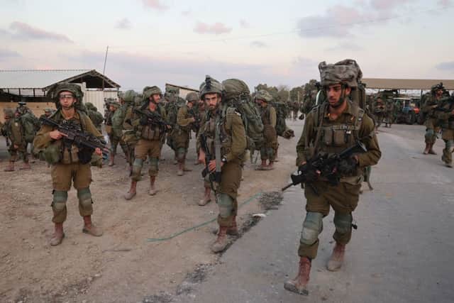 Israeli soldiers deploy at kibbutz Beeri near the border with Gaza on October 11, 2023. Credit: AFP via Getty Images