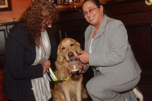 York the dog gets a pint from Linda Charlton and Christine Hughes 19 years ago.