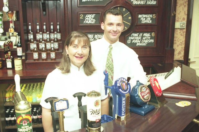 John and Dawn Robinson behind the bar in 1996.