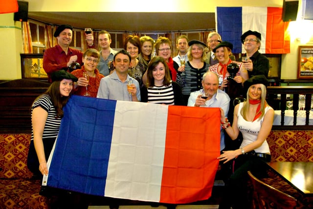 Staff and regulars enjoying a French themed night at the pub in 2010.