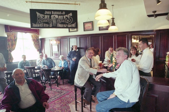 Plenty of faces here. Customers enjoying their day at the pub in 1996.