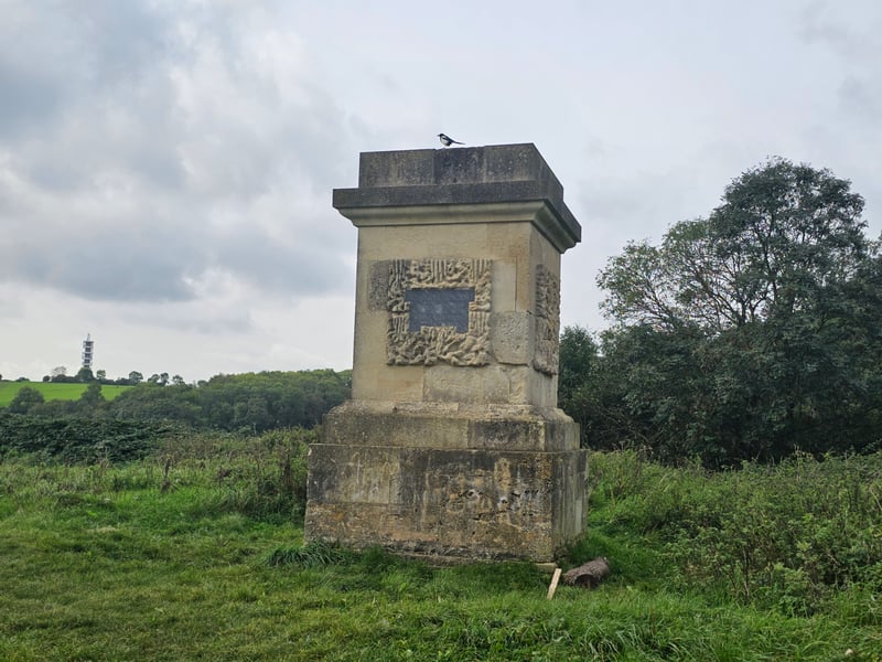 The monument at Stoke Park was built in 1760 to commemorate the life of the daughter of the fourth Duke of Beaufort, Lady Elizabeth Somerset, who died after a fall from her horse near this spot on May 7, 1760. Her ghost is believed to haunt the grounds with horse hooves said to be heard, despite no horses being in the area for years.