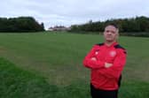 Shaun Pask, manager of Earl Marshall JFC, on the damaged pitch at Northern Avenue.
