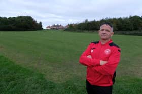 Shaun Pask, manager of Earl Marshall JFC, on the damaged pitch at Northern Avenue.