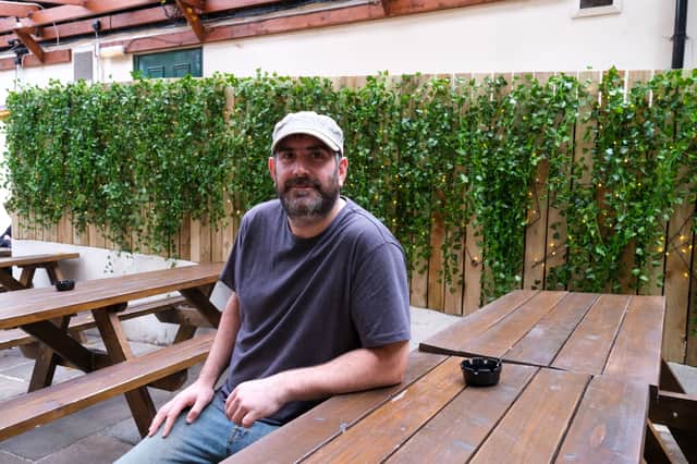 Cathal Langan, owner of The Nottingham House pub, in the recently refurbished garden area. 