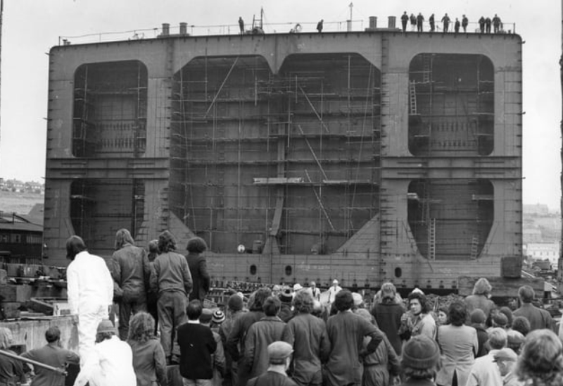 Workers watch as the after section of the 112,000 ton Bibby Line tanker Yorkshire is launched. It would later go to Hebburn Shipbuilding Dock to be joined to the forepart which was being built there. Photo: Shields Gazette