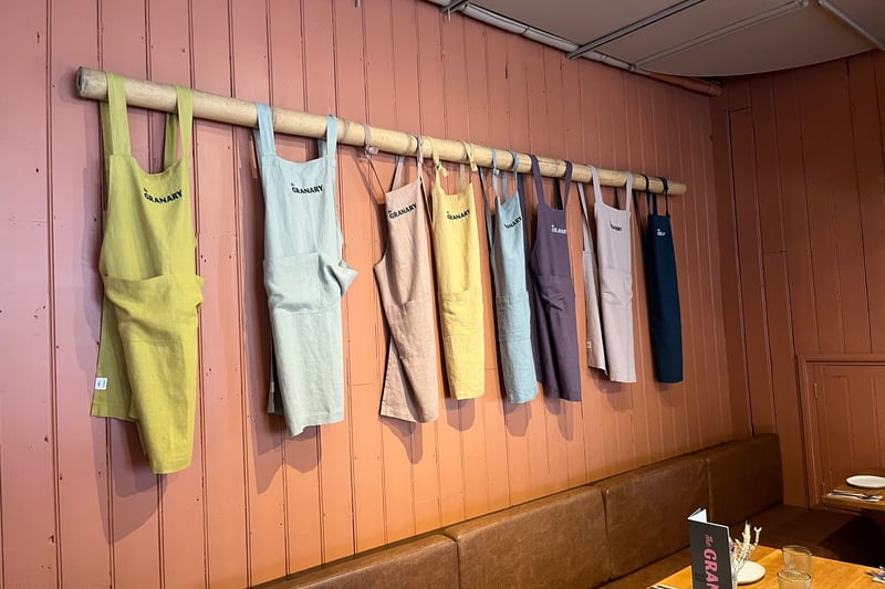 The aprons have the same logo as the original rock club