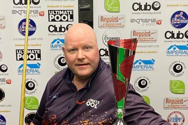 Gary Swift with one of the many snooker trophies he has won