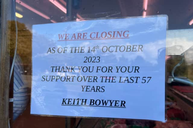Sign in the window of DH Bowyer & Sons, Lodge Moor