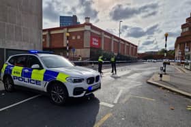 Police are on the scene at the bottom of the Moor, Sheffield, after a suspected stabbing. Picture: David Kessen, National World