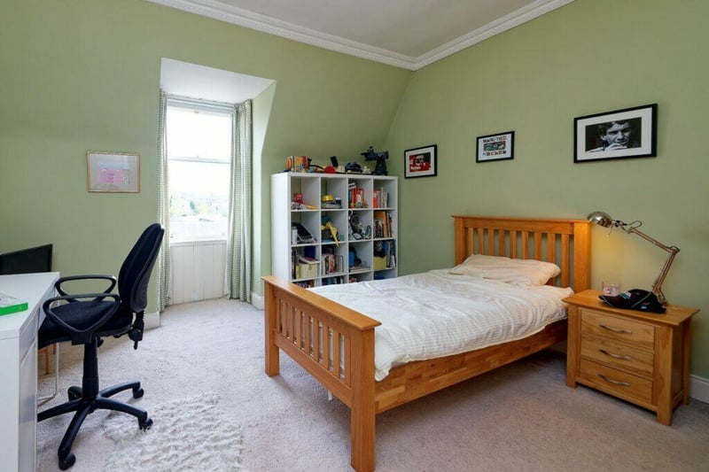 One of the well proportioned bedroom spaces in the house with the property having six in total. 
