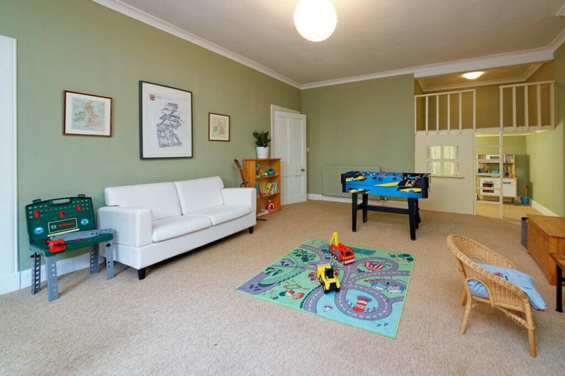 The space on the garden level is a perfect room to keep the kids entertained with it currently being used as a play room. 
