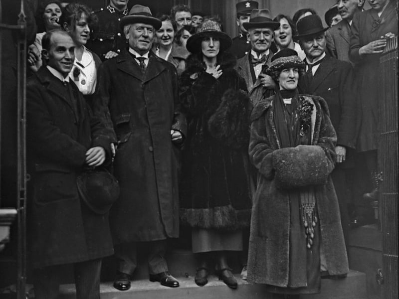 British Liberal politician H. H. Asquith (1852 - 1928, centre, left) with his daughter, Violet Bonham Carter (later Asquith, 1887 - 1969, centre, right), and his second wife, Margot Asquith (1864 - 1945, front, right) at the 1920 Paisley by-election, in February 12, 1920. Asquith won the election, enabling him to return to Parliament after losing his East Fife seat at the 1918 general election. 